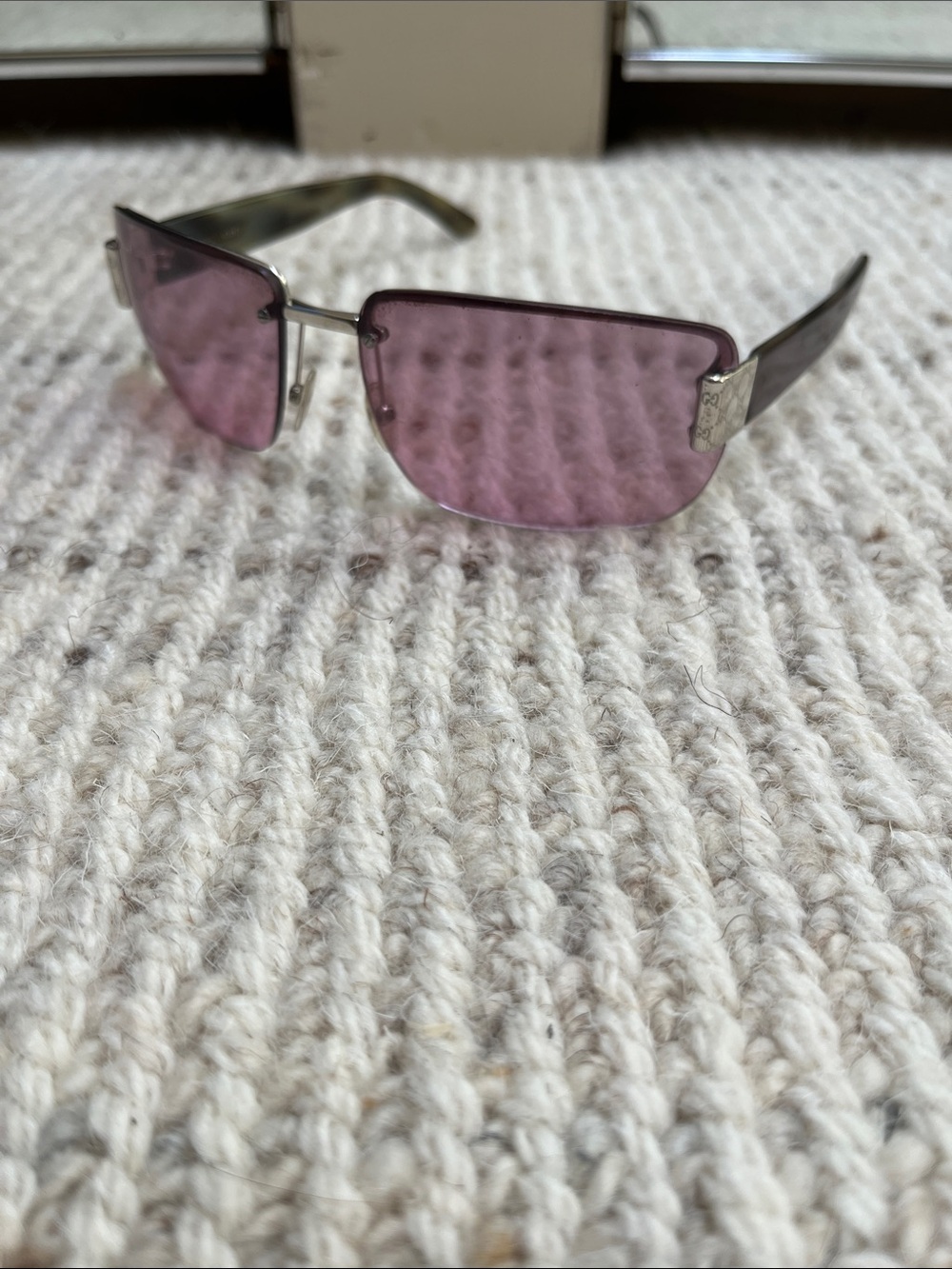 Gucci Women's Rimless 1798 Rimless Sunglasses with Purple Lenses